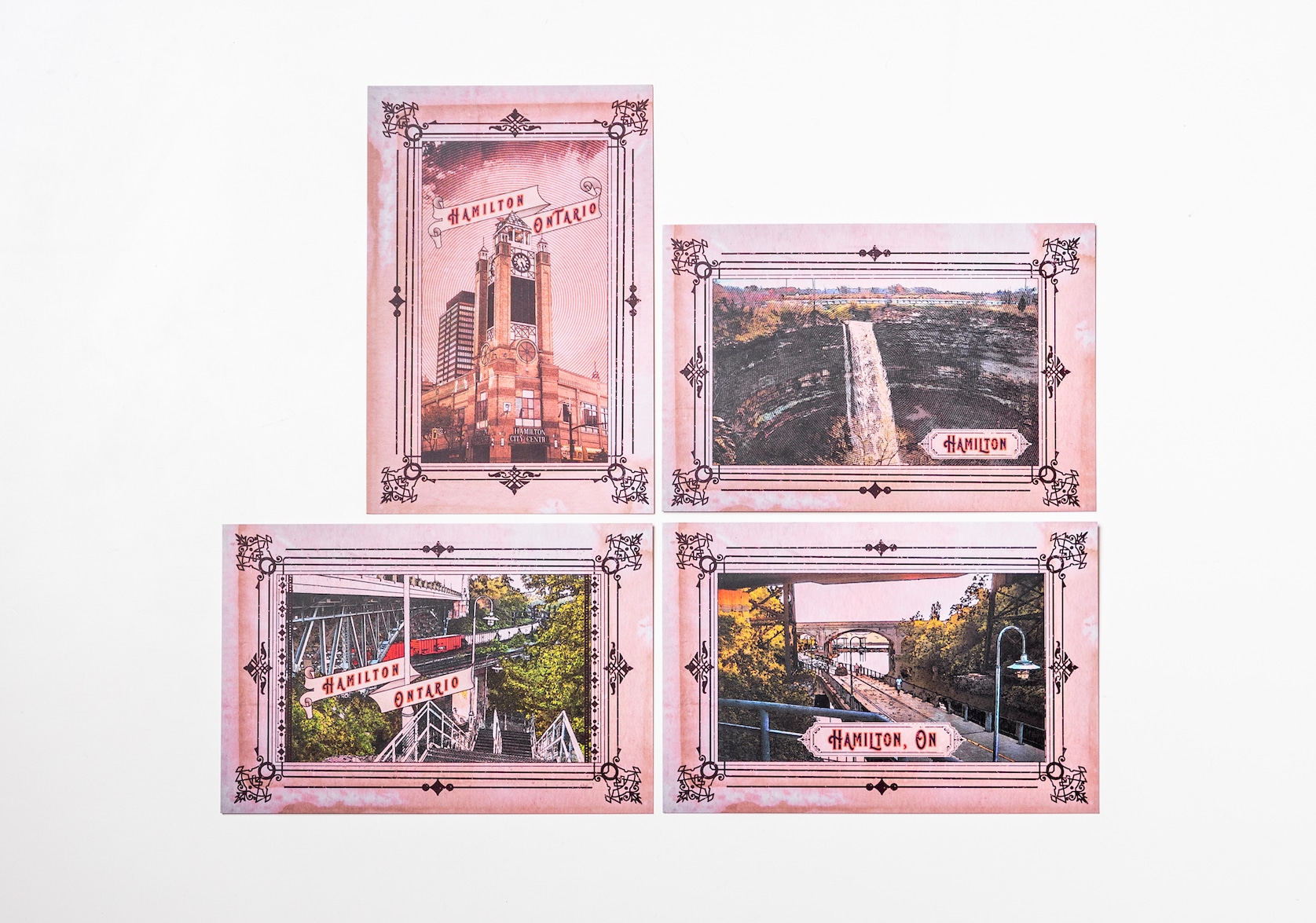 Set of four Hamilton Ontario Postcards. Each postcard features colourful illustrations of different landmarks framed with a black decorative border. A banner is displayed on each postcard with red text that reads: Hamilton or Hamilton, ON or Hamilton, Ontario.