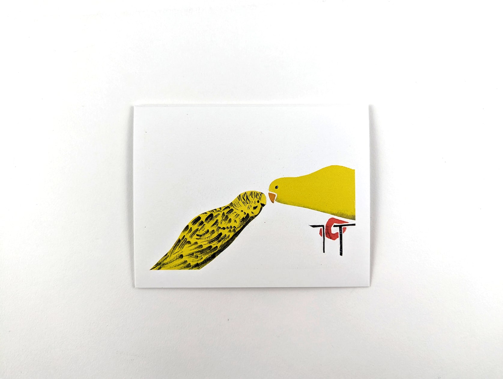 White horizontal card with two painted birds leaning in to touch beaks. The bird on the left is yellow with black stripes and the bird of the right is yellow with an orange beak & talons on a thin black perch